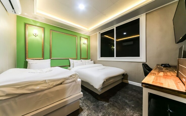 Imagen de la habitación del Hotel GUKMIN. Foto 26
