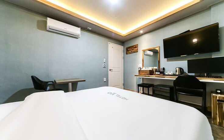 Imagen de la habitación del Hotel GUKMIN. Foto 28