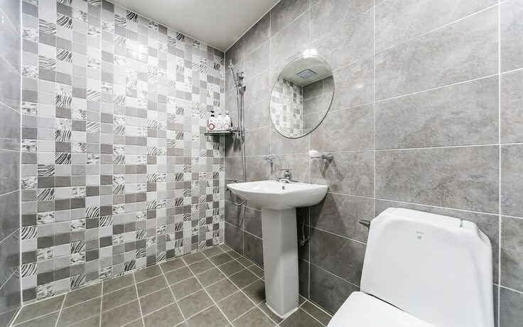 Imagen de la habitación del Hotel GUKMIN. Foto 34