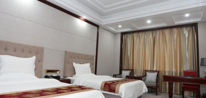 Imagen de la habitación del Hotel GUOYUAN HOTEL. Foto 6