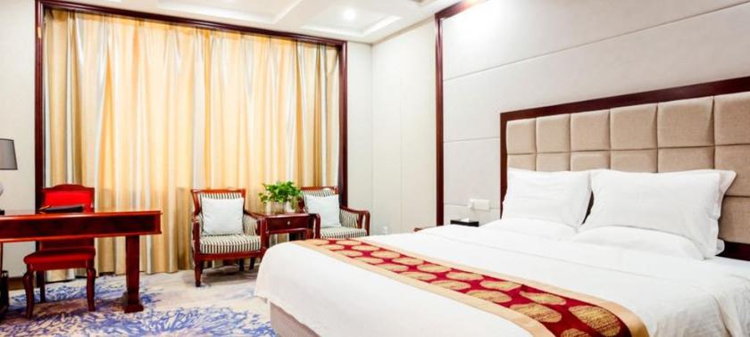 Imagen de la habitación del Hotel GUOYUAN HOTEL. Foto 7