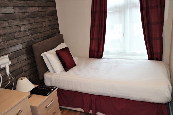 Imagen de la habitación del Hotel Gable End. Foto 8