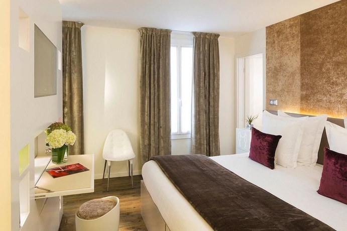 Imagen de la habitación del Hotel Gabriel Paris. Foto 2