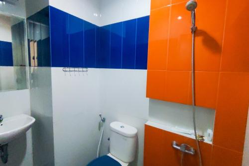Imagen de la habitación del Hotel Gading Serpong Near Stadion Persita Redpartner. Foto 11