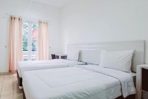 Imagen de la habitación del Hotel Gading Serpong Near Stadion Persita Redpartner. Foto 12