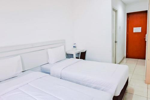 Imagen de la habitación del Hotel Gading Serpong Near Stadion Persita Redpartner. Foto 13