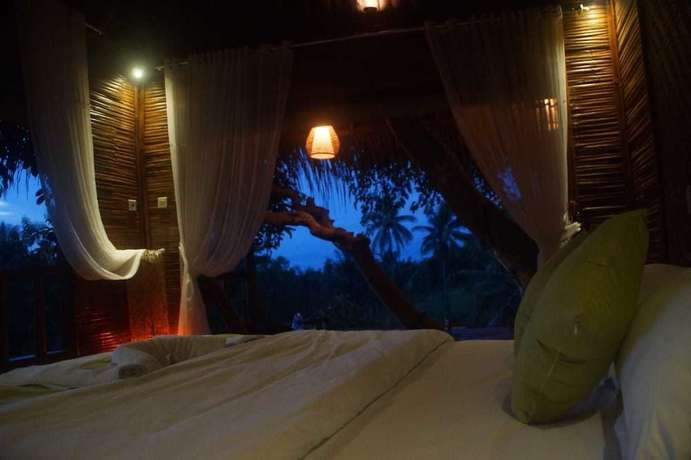 Imagen de la habitación del Hotel Gading Treehouse. Foto 12