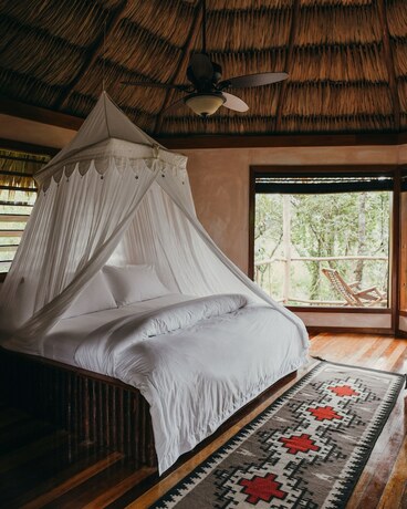 Imagen de la habitación del Hotel Gaia Riverlodge. Foto 18