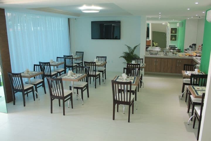 Imagen del bar/restaurante del Hotel Gaia Suites Maca&eacute;. Foto 6