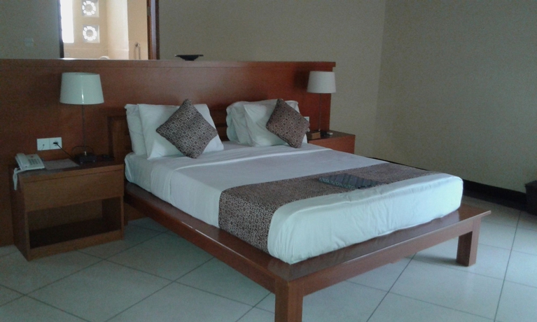 Imagen de la habitación del Hotel Gajah Biru Bungalows. Foto 11