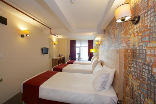Imagen de la habitación del Hotel Galata By Boss. Foto 16
