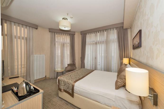 Imagen de la habitación del Hotel Galata La Bella Hotel. Foto 15