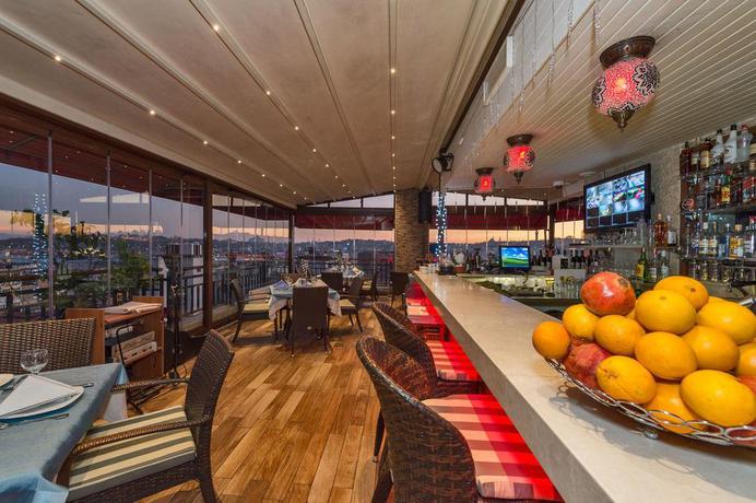 Imagen del bar/restaurante del Hotel Galata La Bella Hotel. Foto 9