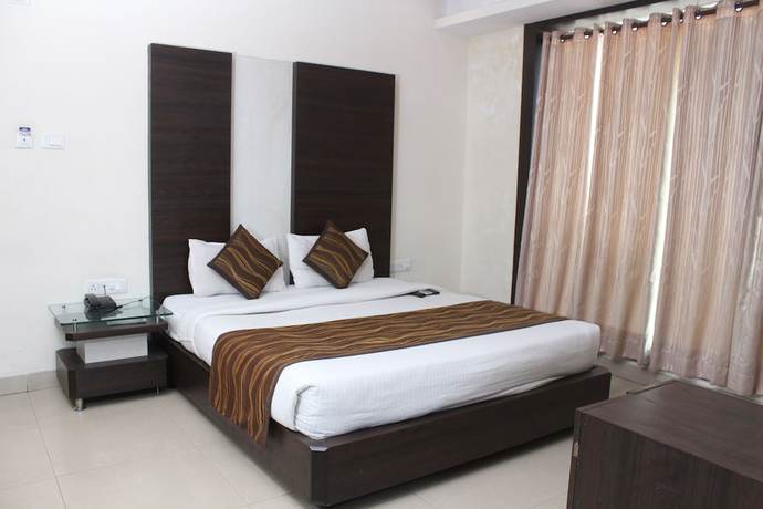 Imagen de la habitación del Hotel Galaxy, Allahabad. Foto 7