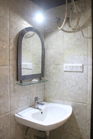 Imagen de la habitación del Hotel Galaxy, Allahabad. Foto 9
