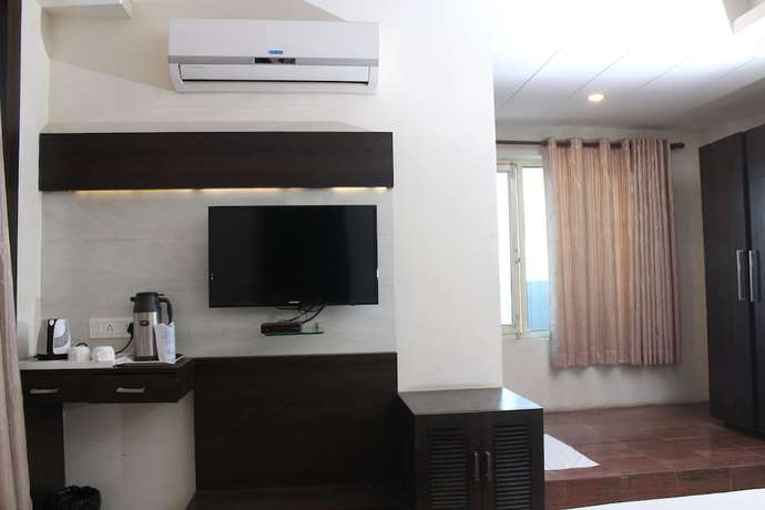 Imagen de la habitación del Hotel Galaxy, Allahabad. Foto 13