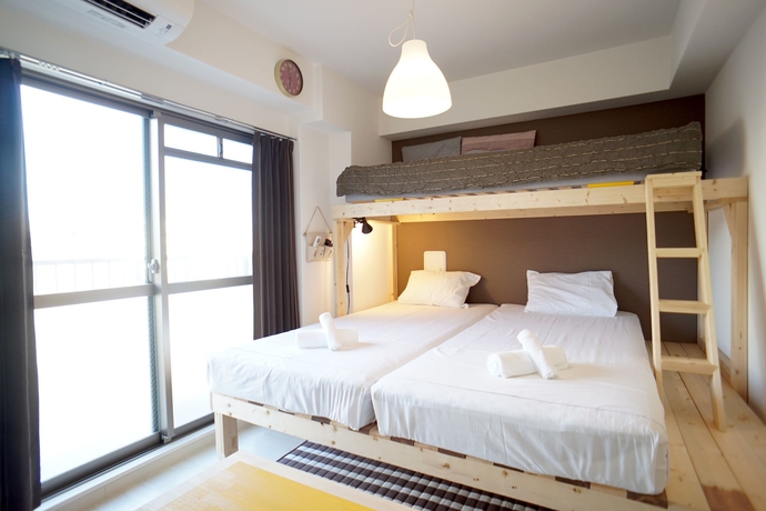 Imagen de la habitación del Hotel Galaxy Apartment, Osaka. Foto 10