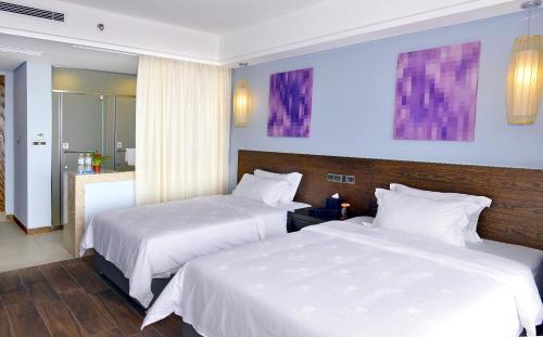 Imagen de la habitación del Hotel Galaxy Bay Resort. Foto 7