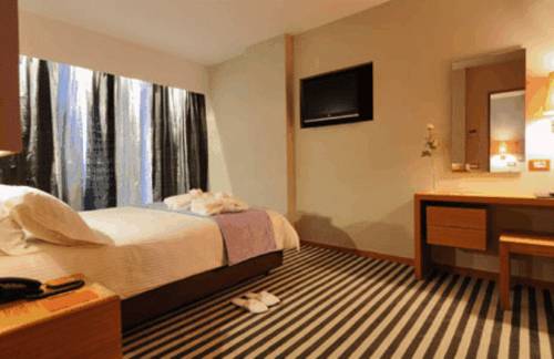 Imagen de la habitación del Hotel Galaxy City Center. Foto 6