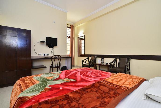 Imagen de la habitación del Hotel Galaxy, Dehradun. Foto 9