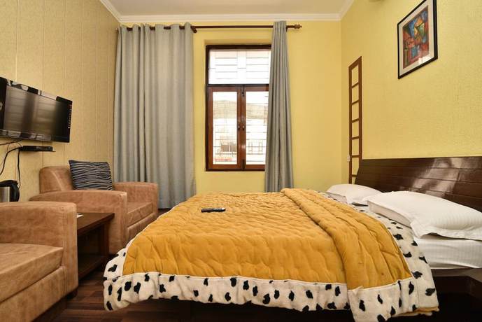 Imagen de la habitación del Hotel Galaxy, Dehradun. Foto 10
