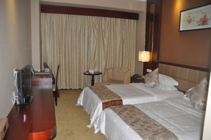 Imagen de la habitación del Hotel Galaxy, Guangzhou. Foto 2