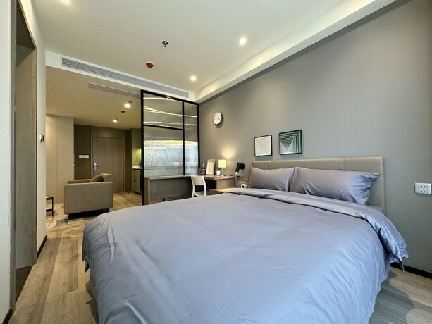 Imagen de la habitación del Hotel Galaxy JunYu Apartment. Foto 13