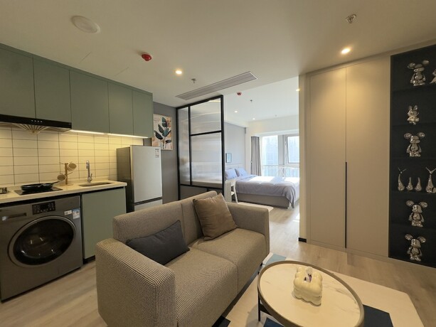 Imagen de la habitación del Hotel Galaxy JunYu Apartment. Foto 14