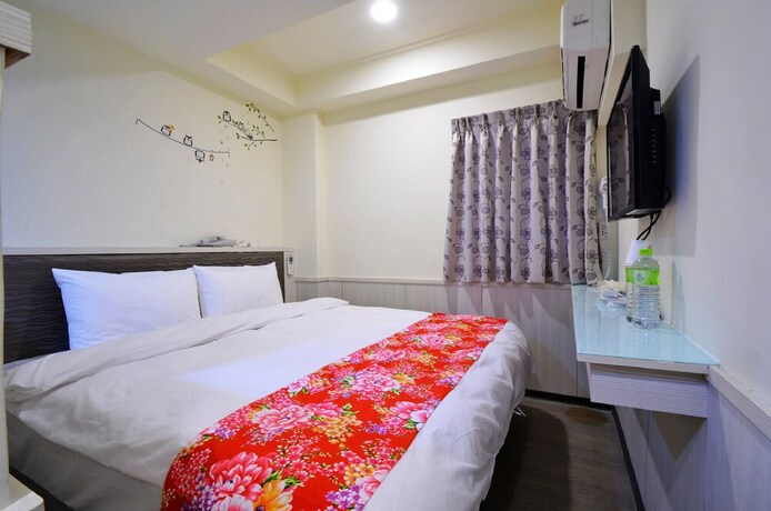 Imagen de la habitación del Hotel Galaxy Mini Inn. Foto 18
