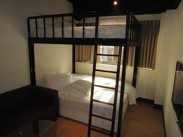 Imagen de la habitación del Hotel Galaxy Mini Inn. Foto 21