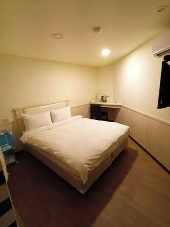 Imagen de la habitación del Hotel Galaxy Mini Inn. Foto 22