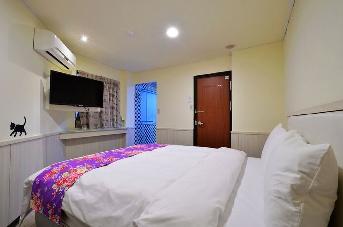 Imagen de la habitación del Hotel Galaxy Mini Inn. Foto 25