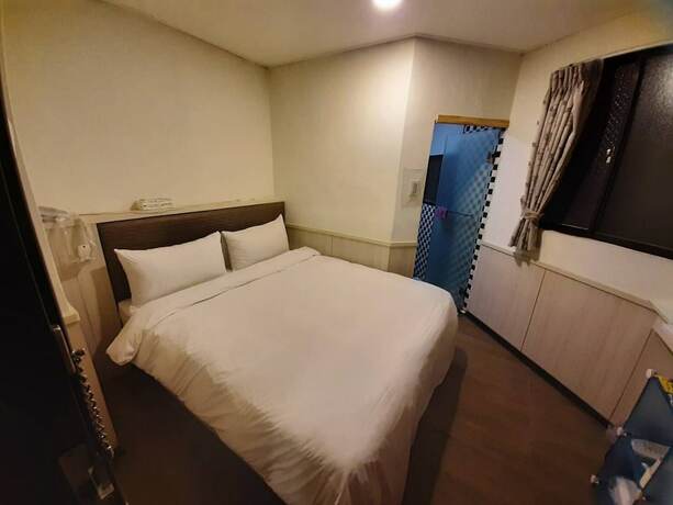 Imagen de la habitación del Hotel Galaxy Mini Inn. Foto 27