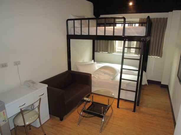 Imagen de la habitación del Hotel Galaxy Mini Inn. Foto 30