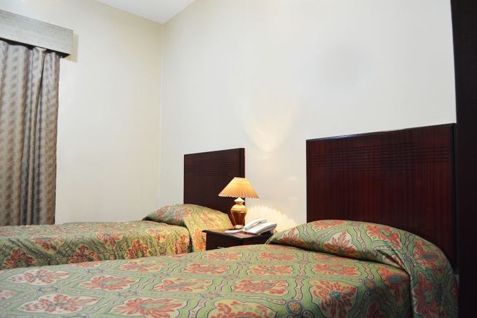 Imagen de la habitación del Hotel Galaxy Plaza. Foto 8