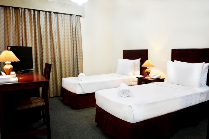 Imagen de la habitación del Hotel Galaxy Plaza. Foto 10