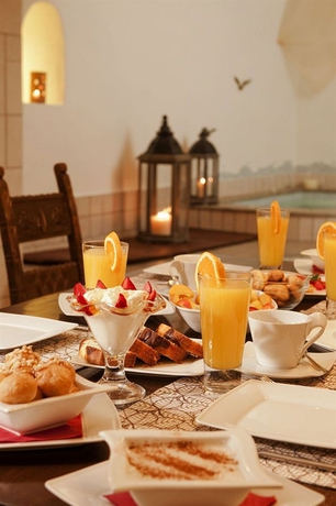 Imagen del bar/restaurante del Hotel Galaxy Suites and Villas. Foto 5