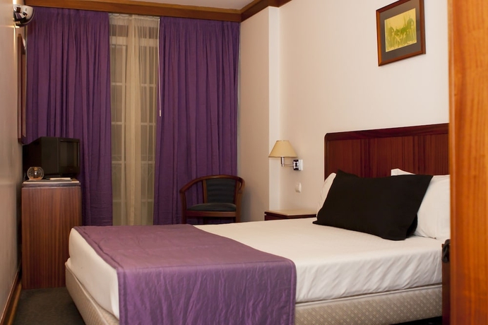 Imagen de la habitación del Hotel Galeria Suite. Foto 7