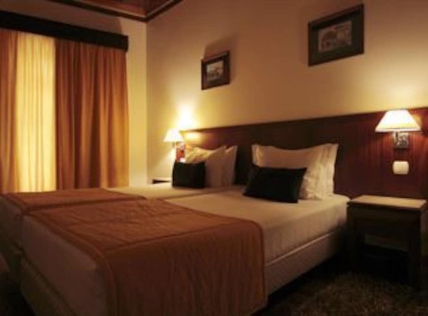 Imagen de la habitación del Hotel Galeria Suite. Foto 12