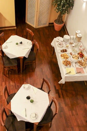 Imagen del bar/restaurante del Hotel Galeria Suite. Foto 3