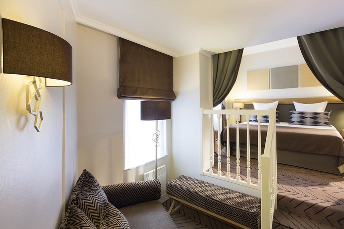 Imagen de la habitación del Hotel Galileo, París. Foto 2