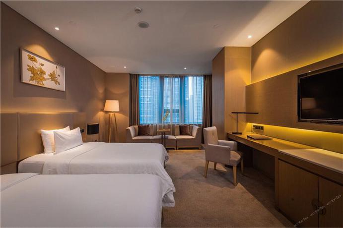 Imagen de la habitación del Hotel Gallery .f Wuhan. Foto 5
