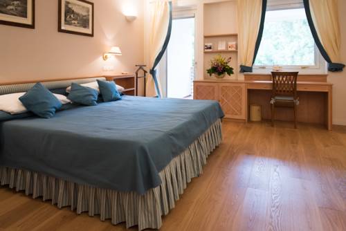 Imagen de la habitación del Hotel Gallia Palace - Relais & Châteaux. Foto 2