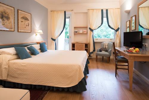 Imagen de la habitación del Hotel Gallia Palace - Relais & Châteaux. Foto 10