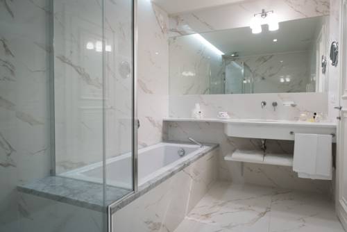 Imagen de la habitación del Hotel Gallia Palace - Relais & Châteaux. Foto 15