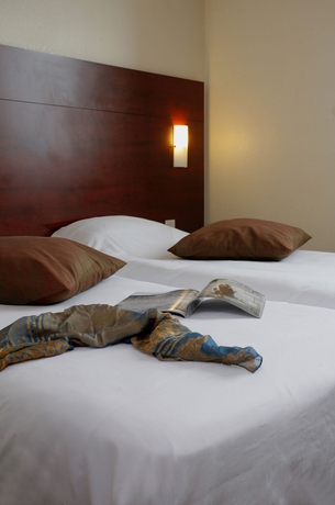 Imagen de la habitación del Hotel Gallieni. Foto 13