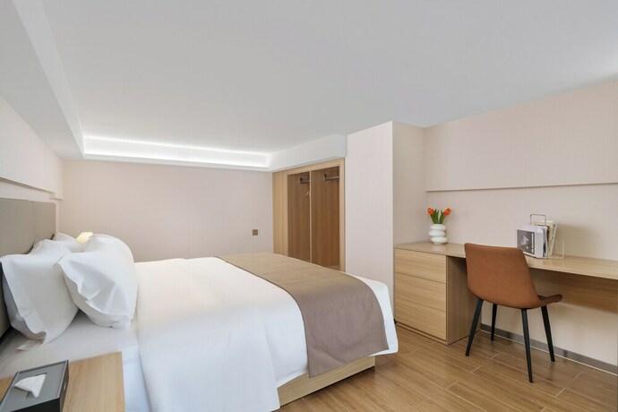 Imagen de la habitación del Hotel Galory Service Apartment. Foto 18