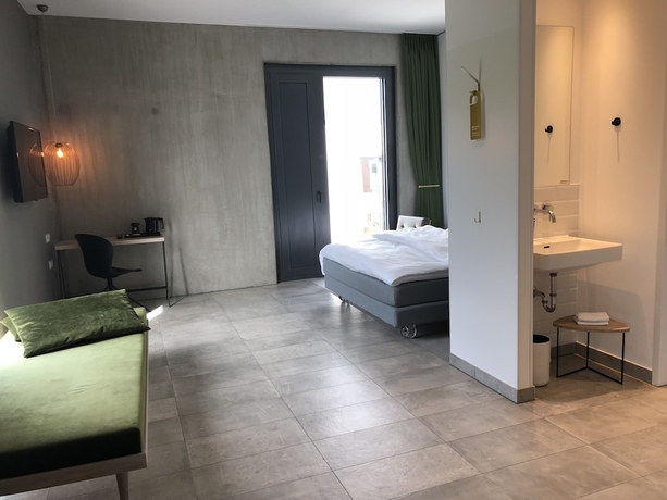 Imagen de la habitación del Hotel Gambino Cincinnati. Foto 15