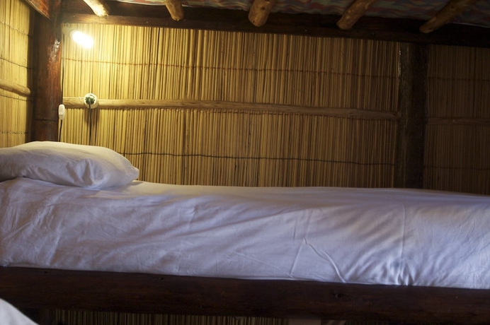 Imagen de la habitación del Hotel Gamboozini Lodge. Foto 8