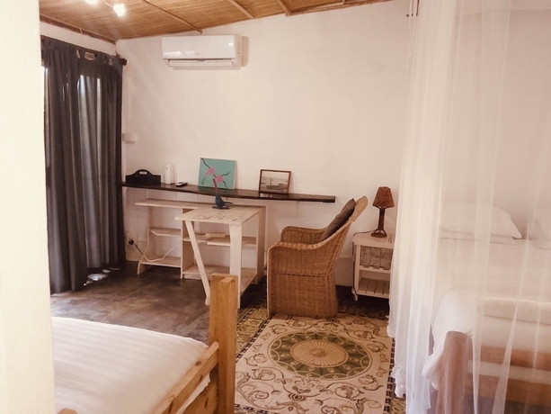 Imagen de la habitación del Hotel Gamboozini Lodge. Foto 13